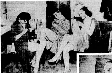 Image: Knitting comforts for the soldiers is practised in. all sorts of places in England, and few women have idle moments. Above, girls in the non-stop revue at the Prince of Wales Theatre, London, utilise their spare moments by knitting scarves, balaclavas, or socks. Right, a girl member of the Women's Auxiliary Territorial Service trying oh a balaclava which, has been made out of ladies1 silk stockings by a method of interweaving. (Evening Post, 02 March 1940)