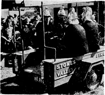Image: Evening Post" Photo. Trailer outfit built. by members of tlie Stokes: Valley Volunteer Fire Brigade, and manned by some members of the brigade, when the new fire station building was opened on Saturday by Mr. H. E. Combs, M.P. (Evening Post, 12 November 1940)