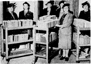 Image: Members of the library section of the Wellington Hospital Women's Auxiliary with some of the ivagons used to take books to patients. Mrs. O'Leary, who has been honorary librarian fouls years, is in the foreground, the other ladies being some of Jier assistants. (Evening Post, 23 October 1943)