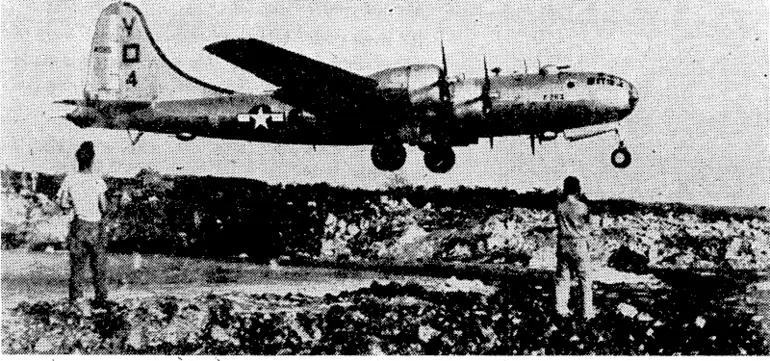 Image: Lifting its heavy load of bombs at the end of the runway on Saipan, this United States Super-Fortress heads for Tokio in the early dawn. (Evening Post, 10 January 1945)