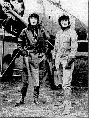 Image: Sport and General, Photo. Tho lady on the left.ls wearing a thick leather coat with Wellinoton boots to match and fur-lined cap, while tho smartly-attired lady on the right wears a novel one-piece suit with Wellington hoots and fur cap to match. (Evening Post, 24 August 1929)