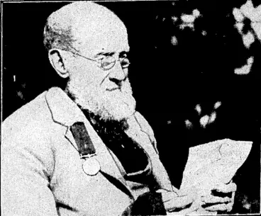 Image: A. K. Kingsford Photo, CORPORAL J. COLTHART, Maori War veteran of the Wanganui Regiment, ivho yesterday celebrated his hundredth birthday at Nelson, He is heic seen reading leljers and telegrams of. congratulations (Evening Post, 26 April 1933)