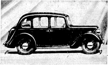 Image: APPEARAiNCE WITH COMFORT.—The new Austin 10-4 Cambridge Saloon. Modern in design, it provides generous interior space and good appearance. The forward mounting of the engine will be noted, all-steel body and w ell-designed rear. Like all the Austin range, it has a side-valve engine and four-speed gear-box, with synchro-mesh engagement for second, third, and top. (Evening Post, 17 October 1936)