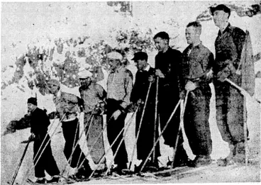 Image: Evening Post" Photo. Competitors .who 'took:part,in the open langlauf, a cross-country ski race of three miles auhe Ruapehw. Ski Club's snoio sports-at Tongariro< National Park\ last week. The winner was J. Loveridge^-whp is fourth from the left. ■ ■■'■■■■■'.■■".■' (Evening Post, 08 September 1937)
