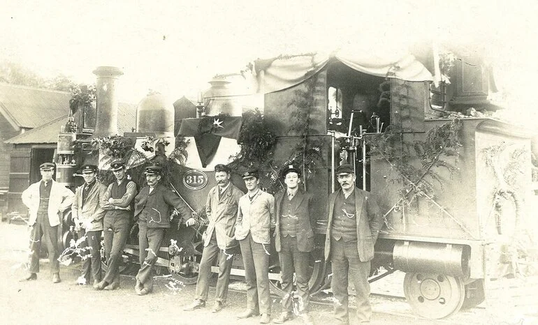 Image: Postcard of train engine and railway staff at Belgrove