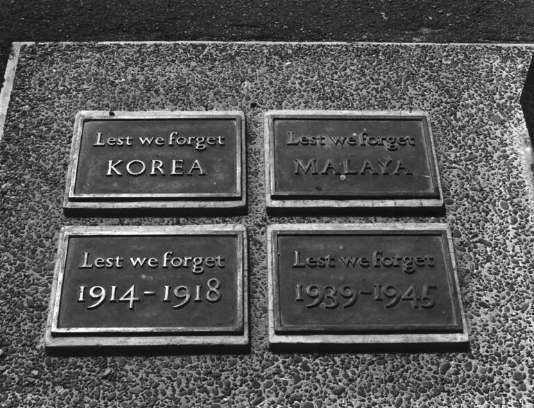 Image: War memorial plaques, on pavement outside City Council offices.