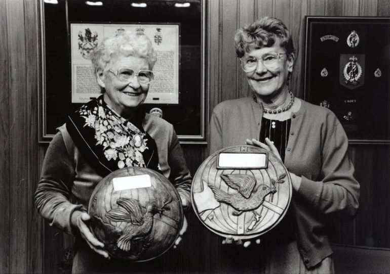 Image: Nuclear-weapon-free city plaques; sculptor Frances Wood, Peace Action president Gwen Johnson.