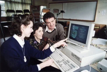 Image: Upper Hutt College; Jennifer Risdon demonstrates computer to founding students Heather Marryatt, David Head.