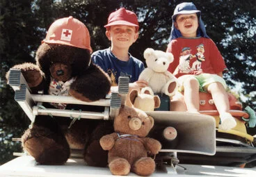 Image: Teddy bears' picnic, 1999; Mitchell Tyler and Fraser Hoyland on the Red Cross Landrover, Harcourt Park.