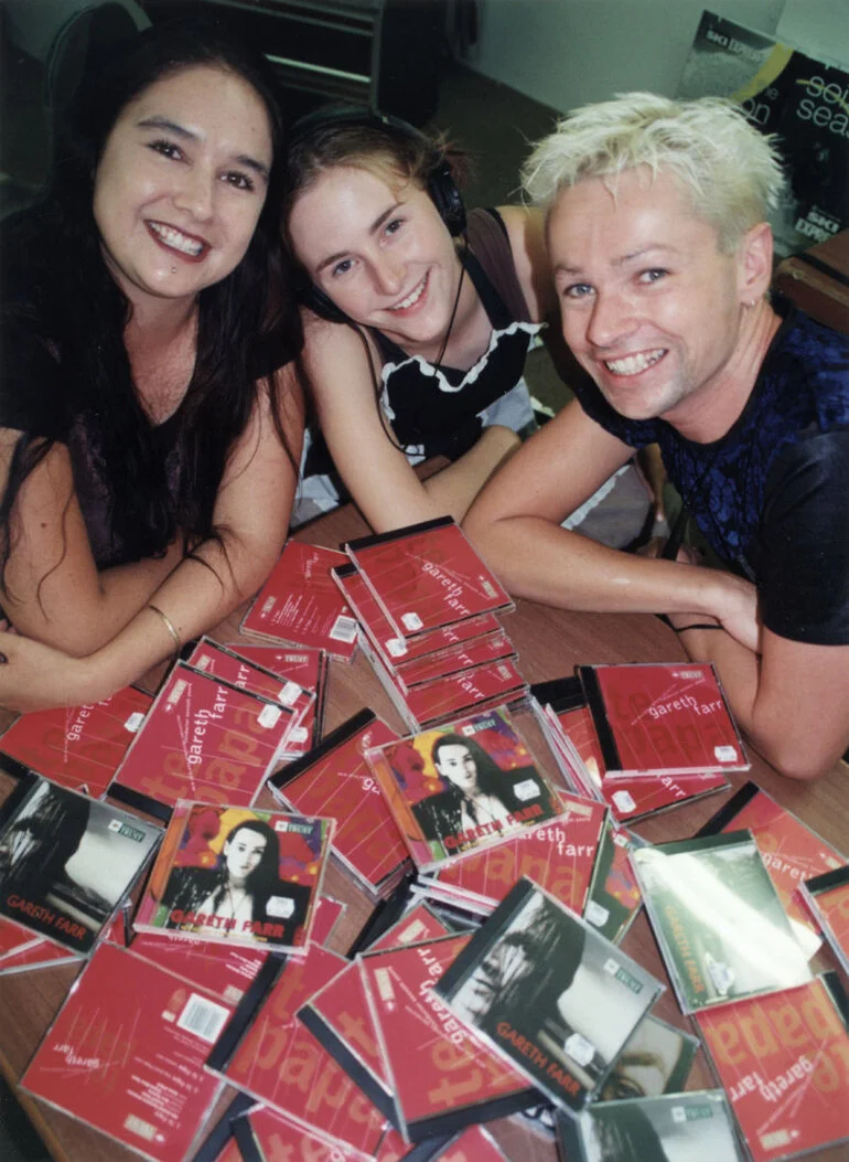 Image: Tower Music, 113 Main Street; composer Gareth Farr with CDs of his music; Tina Henderson, Julia Harrison.