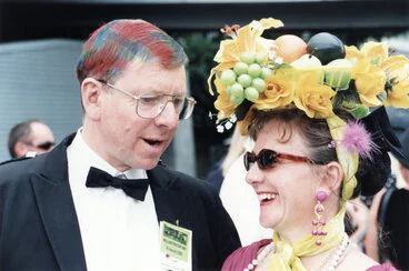 Image: Trentham racecourse; Wellington Cup day fashion; city promotion manager Paul Lambert, and Ngaire Mann with $8 hat.