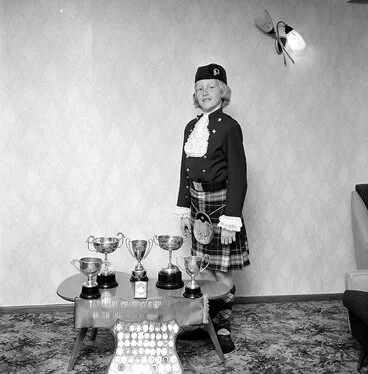 Image: Tracey Watson with Highland dancing trophies. [P1-1165-3555]