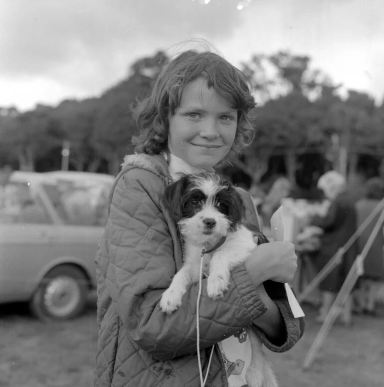 Image: A & P show; pet parade; girl and puppy