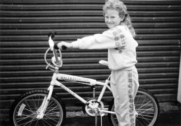 Image: Kyleen Russell, 7, wins a bike in a New Zealand Life Insurance Hutt Valley colouring competition.