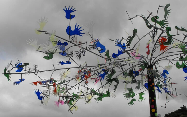 Image: Street art; corner of Main Street and Pine Avenue; fantail tree details.