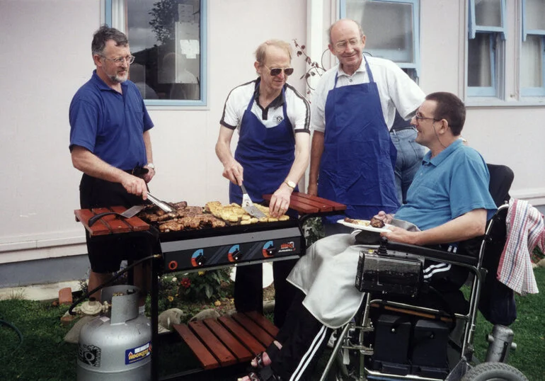 Image: Spring Lodge; third annual Kiwanis barbecue; members Gerald Mulholland, Graeme Ballantyne, Kevin Paterson serving former member Alan Terry.
