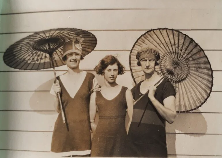Image: Three Ladies with Japanese umbrellas at Waihi Beach