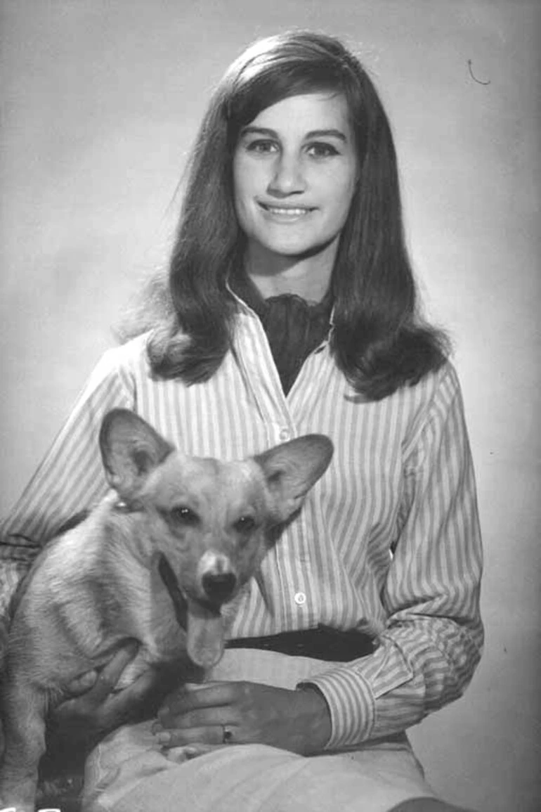 Image: 1/2 portrait of Miss Lowell Goddard and a corgi