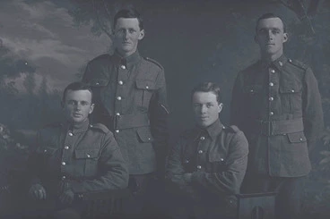 Image: 3/4 group portrait of 3 Privates and 1 Lance Corporal, including on the right, Private (Corporal in the nominal roll) Eric Tonks, Reg No 24/315, of the Samoan Advance and the 2nd Battalion New Zealand Rifle Brigade, New Zealand Signal Corps.