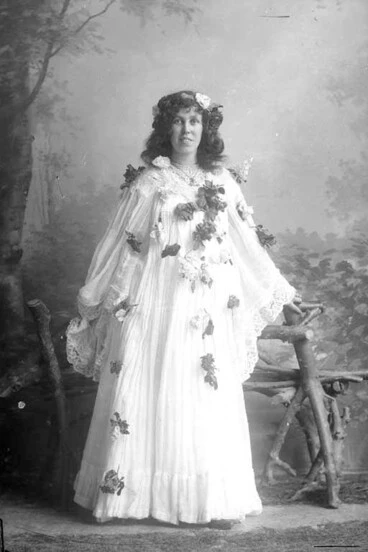Image: Full portrait of Miss Lily Roberts who has her hair loose and....