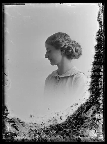 Image: 1/4 length profile portrait of Miss Dewith? (Duvith?) wearing her hair plaited.