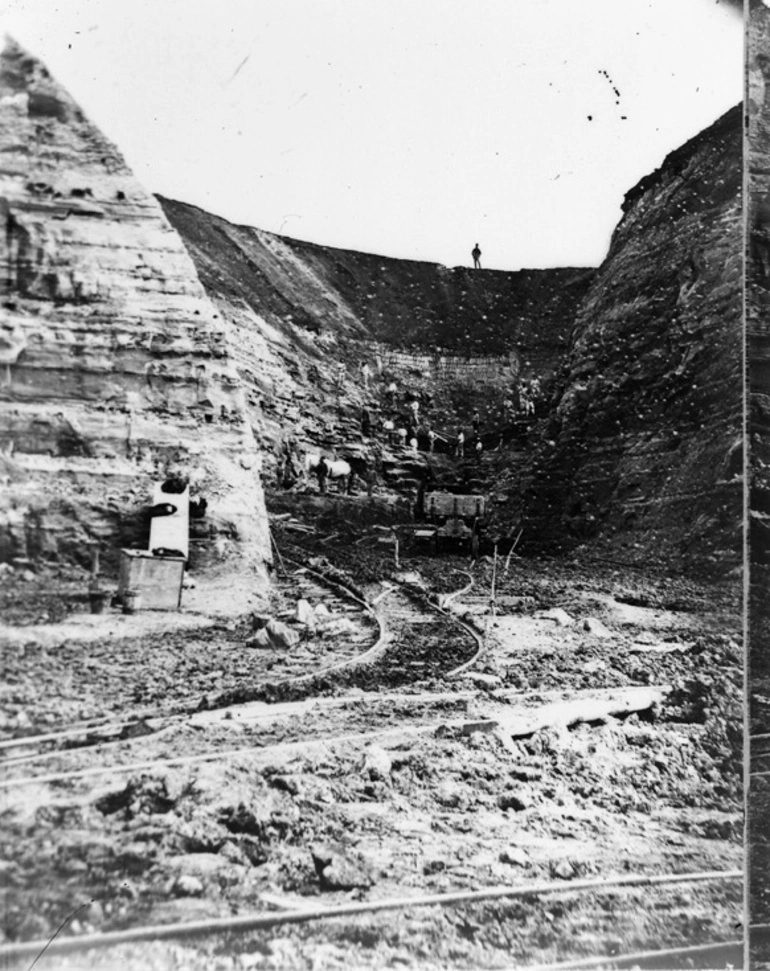 Image: Men working on the cutting and carting of spoil during the demolition of Point Britomart
