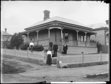 Group gathered outside a villa... Image: Group gathered outside a villa...