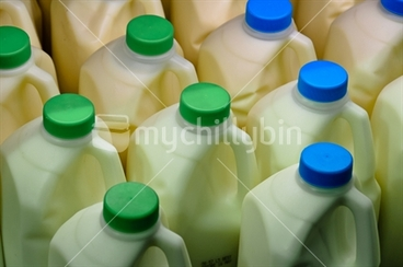 Image: New Zealand green and blue plastic milk bottles, (ISO500).