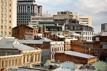 Image: City skyline showing old facades and brick buildings amongst the modern. Christchurch before the earthquakes.