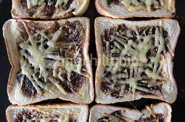 Image: Slices of grilled cheese and marmite toast.