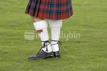 Image: Scotchman bottom half in a tartan kilt