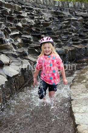 Image: Girl cooling off after a bike ride