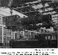 Image: (Photo. D. J. Sherriff.) — Locomotive Ub. 334, the first to be lifted by the 100-ton crane in the new Erecting Shop at Hillside