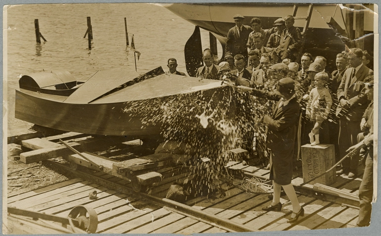 Image: Mrs Elizabeth McCombs christening a motorboat