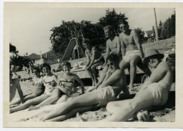 Image: Sunbathers on Akaroa waterfront