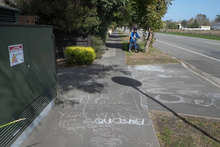 Image: Child riding a bike on Wigram Road, Halswell
