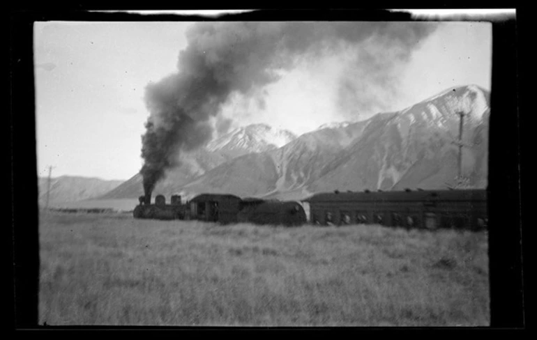 Image: Train with mountains in background