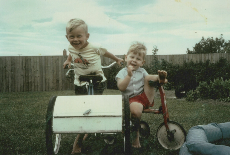 Image: Glen and John Slaughter on bicycles