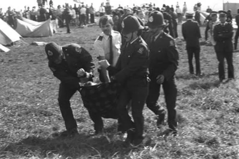 Image: Police carrying off protestor. Orakei Bastion Point Occupation