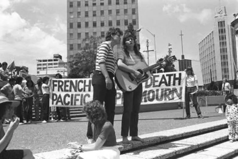 Image: Topp Twins performing in Aotea Square. Pacific Peace Hui march to French Consulate in Princes Street, Auckland