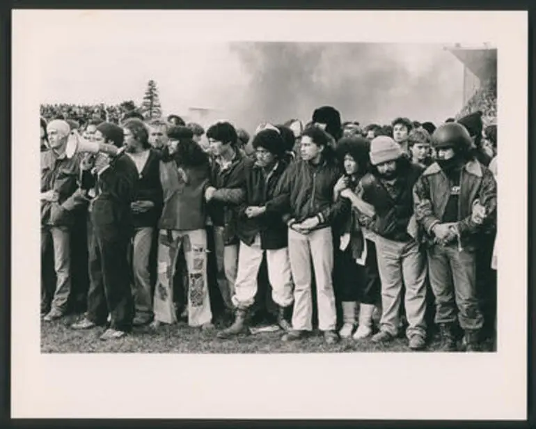 Image: [Protesters occupy a rugby pitch]