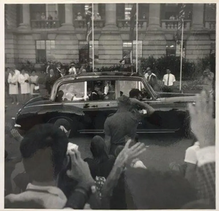 Image: HM Queen Elizabeth II & Prince Charles (Prince Philip & Princess Anne obscured behind them) departing in regal Rolls Royce limousine. Opening of Parliament. March 1970.