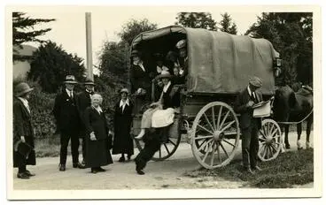Image: Photograph, Black and White: Lovell-Smith family group prepare to leave for a picnic in a covered wagon.