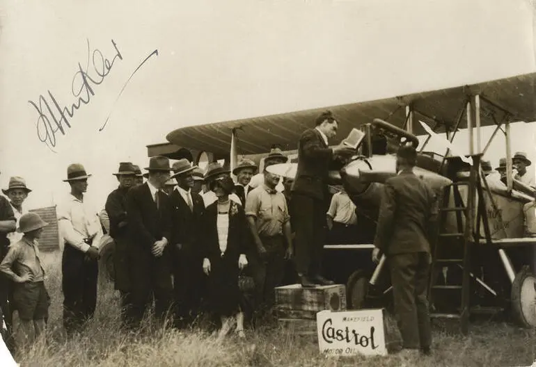 Image: Bert Hinkler pouring oil into engine of Avro Avian G-EBOV in Australia at the end of his flight from the U.K.