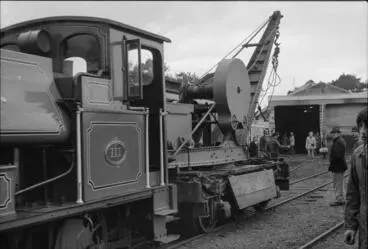 Photograph of locomotive and rail crane Image: Photograph of locomotive and rail crane