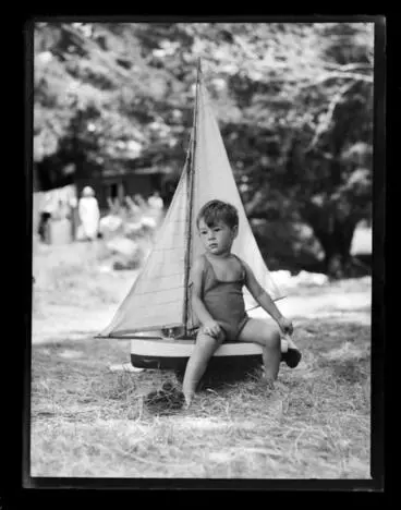 Image: Boy with model yacht