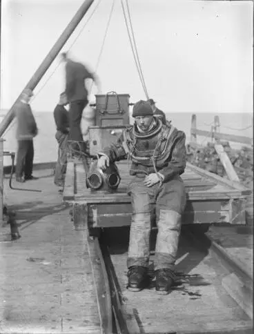Image: William Hearn in diving suit, Opunake wharf