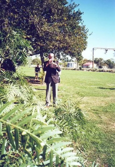 Image: Mr Darcy Ebbett playing 'The Last Post', Anzac Day 2001