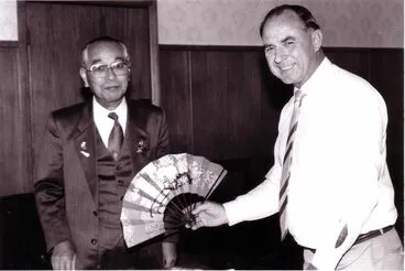Image: Mayor Tom Robinson Accepting Gift From Shimousa Visitor, 1995