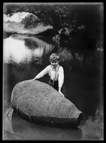 Image: Clyde Adkin with eel trap in Hokio Stream